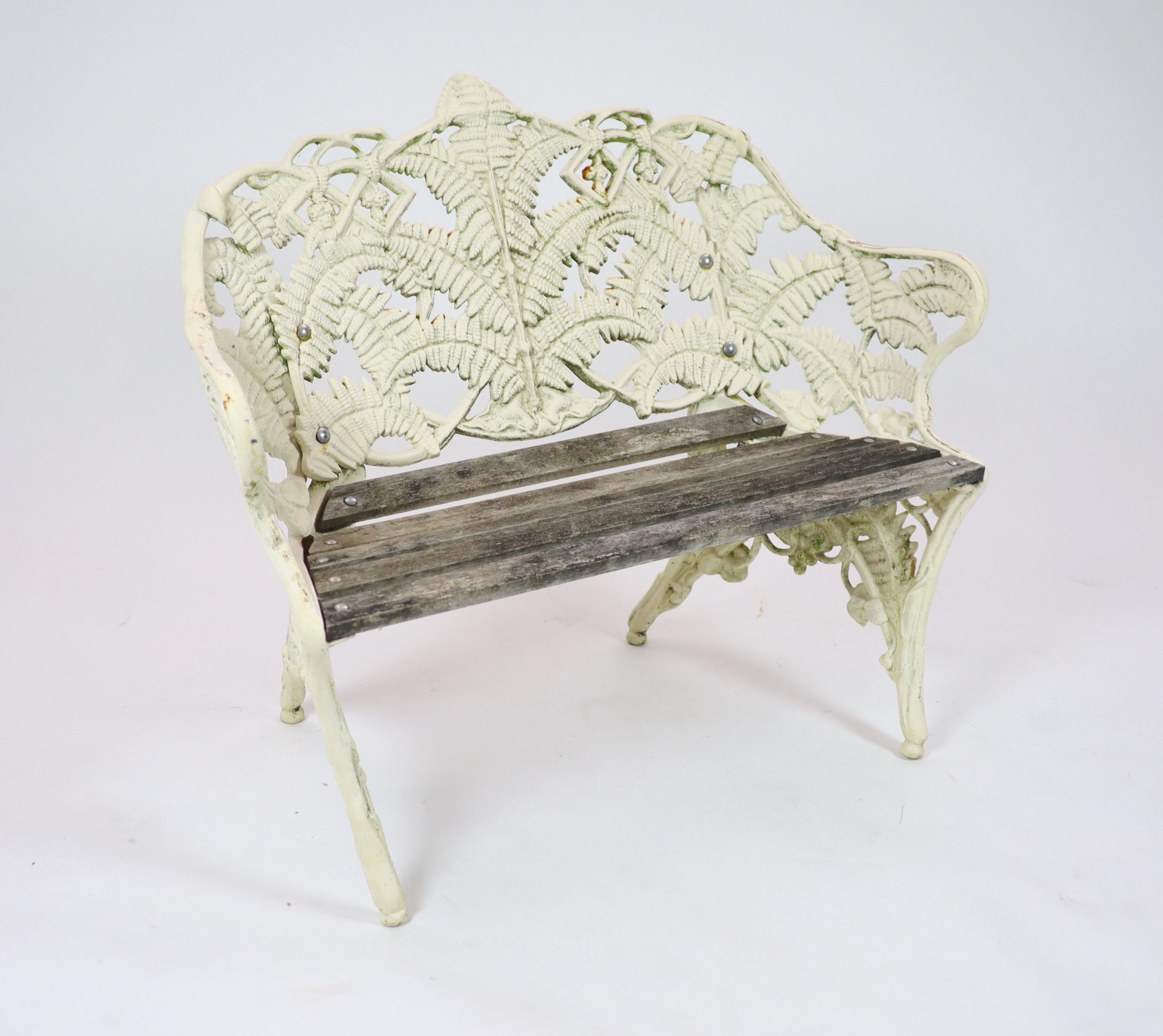 A Victorian cast iron Coalbrookdale 'Fern' pattern garden bench H 86cm. W 112cm. D 56cm.